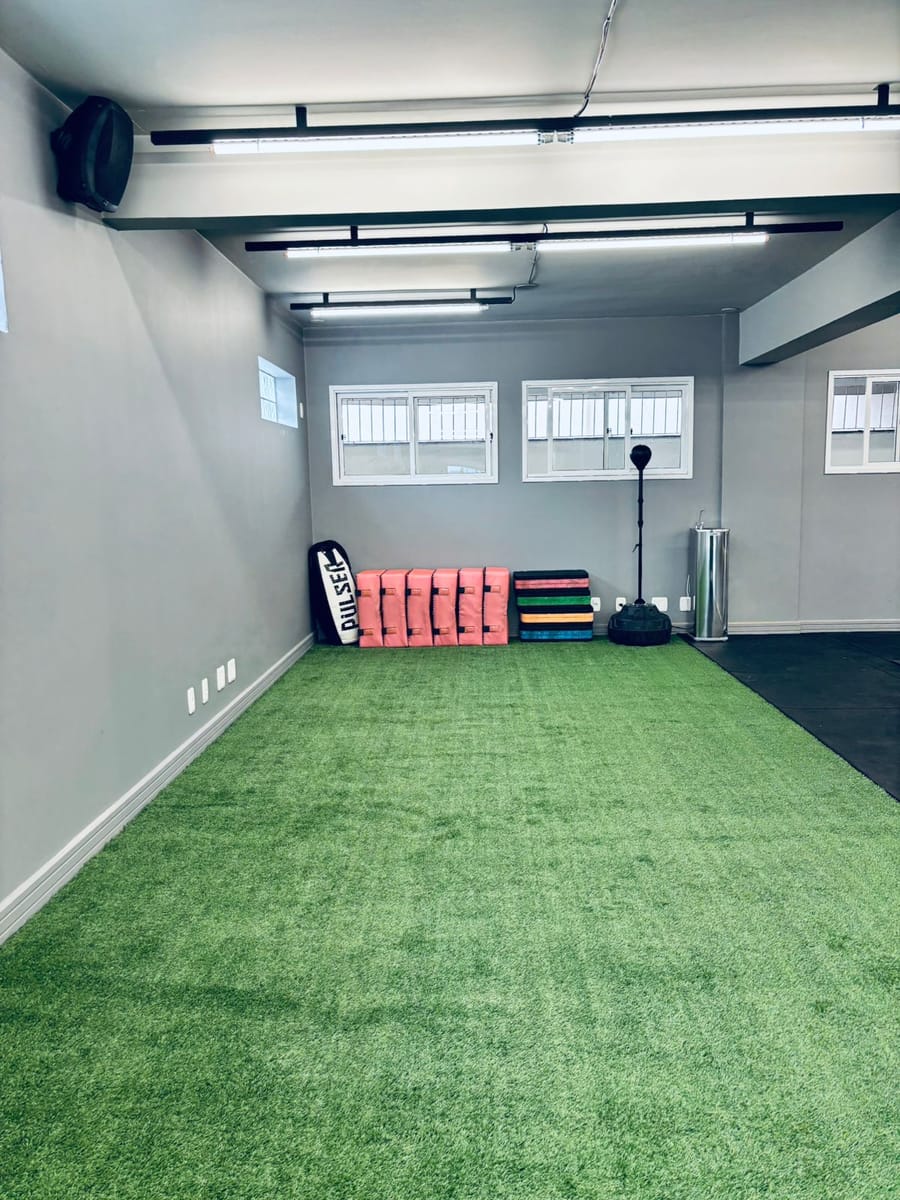 Área de preparação física do Team Fit Club